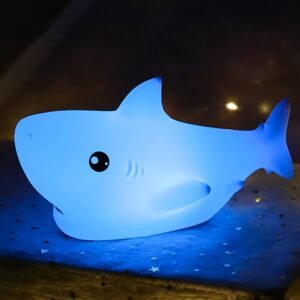Cute Shark Night Light glowing blue - Soft silicone squishy lamp for ocean theme gaming setup and kawaii desk decor